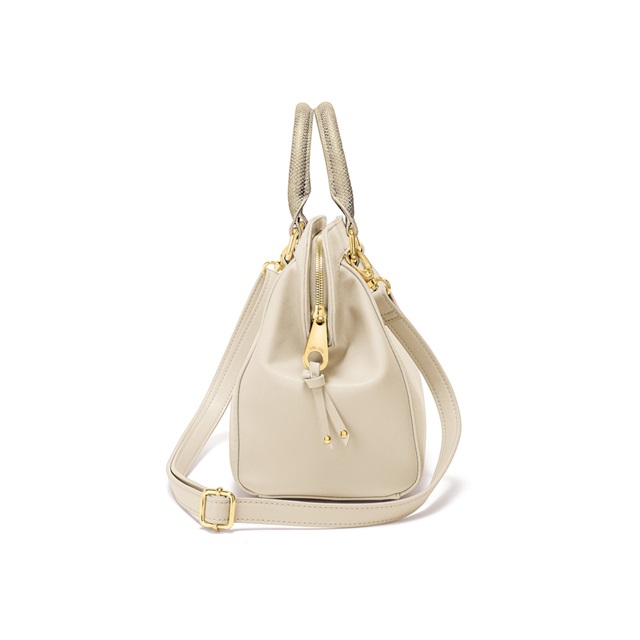 Image of  ON THE GO CREAM HANDBAG